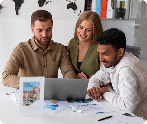 A person in a suit writes in a legal book at a desk, with a gavel and scales of justice nearby, conveying a professional legal setting.
